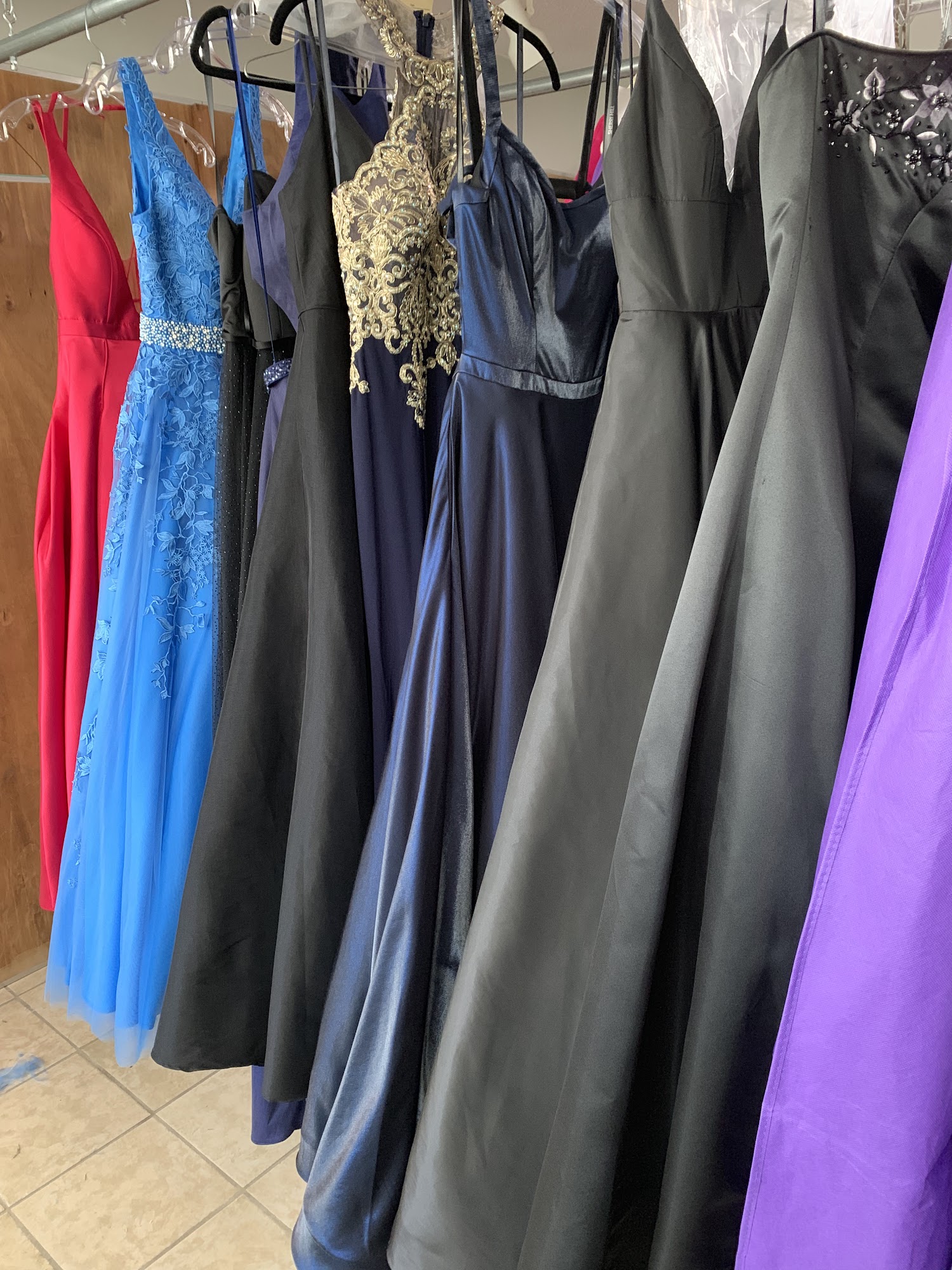 Colorful dresses hanging in the shop